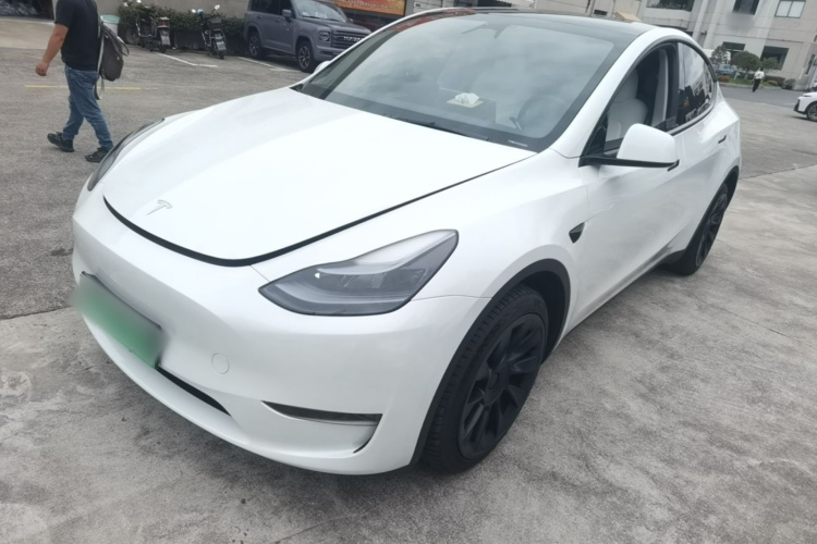 Tesla Model Y 2024 #2 Tesla Model Y 2024 car image #2