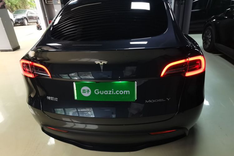Tesla Model Y 2024 #6 Tesla Model Y 2024 car image #6