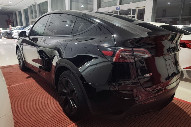 Tesla Model Y 2024 #7 Tesla Model Y 2024 car image #7