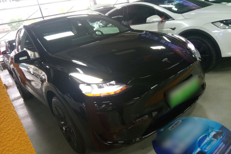Tesla Model Y 2023 #4 Tesla Model Y 2023 car image #4