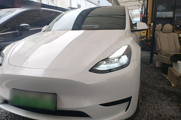 Tesla Model Y 2024 #3 Tesla Model Y 2024 car image #3