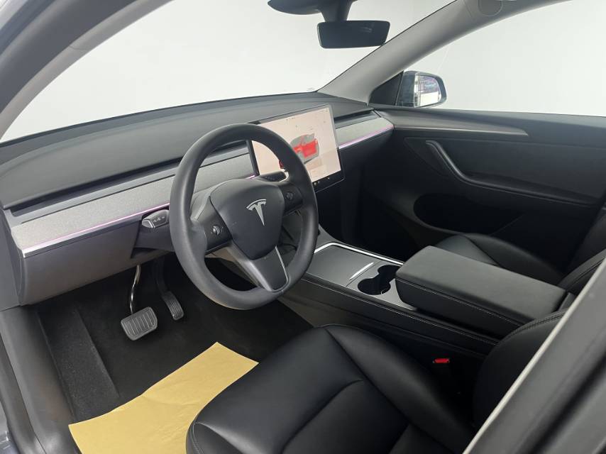 Tesla Model Y 2024 #7 Tesla Model Y 2024 car image #7