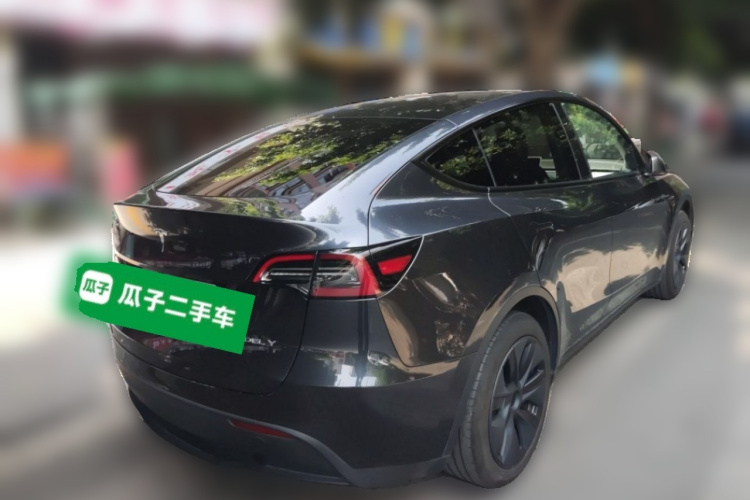 Tesla Model Y 2024 #7 Tesla Model Y 2024 car image #7