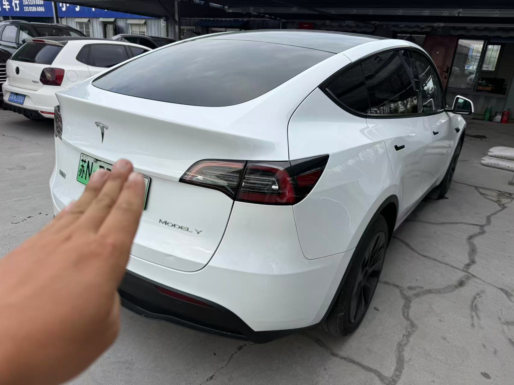 Tesla Model Y 2024 #6 Tesla Model Y 2024 car image #6