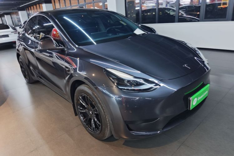 Tesla Model Y 2024 #4 Tesla Model Y 2024 car image #4