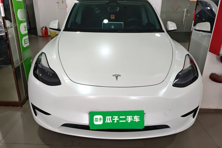 Tesla Model Y 2024 #3 Tesla Model Y 2024 car image #3