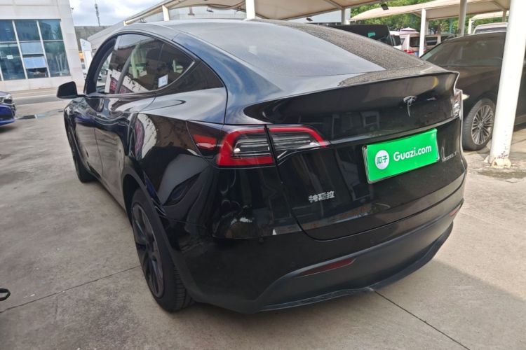 Tesla Model Y 2024 #5 Tesla Model Y 2024 car image #5