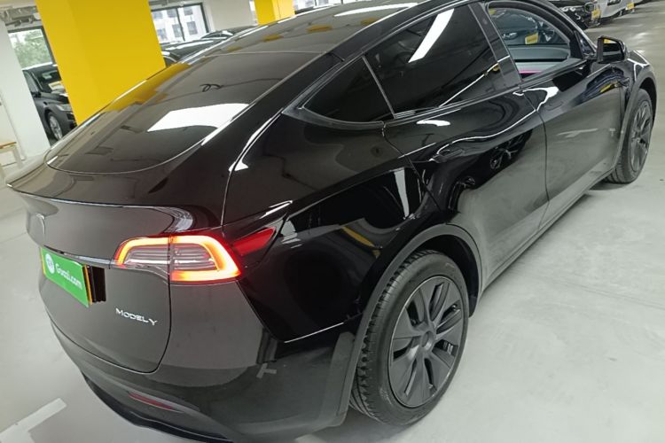 Tesla Model Y 2024 #7 Tesla Model Y 2024 car image #7