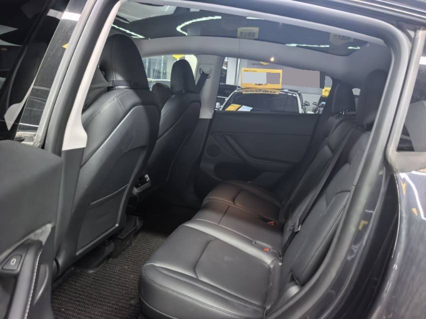 Tesla Model Y 2024 #5 Tesla Model Y 2024 car image #5