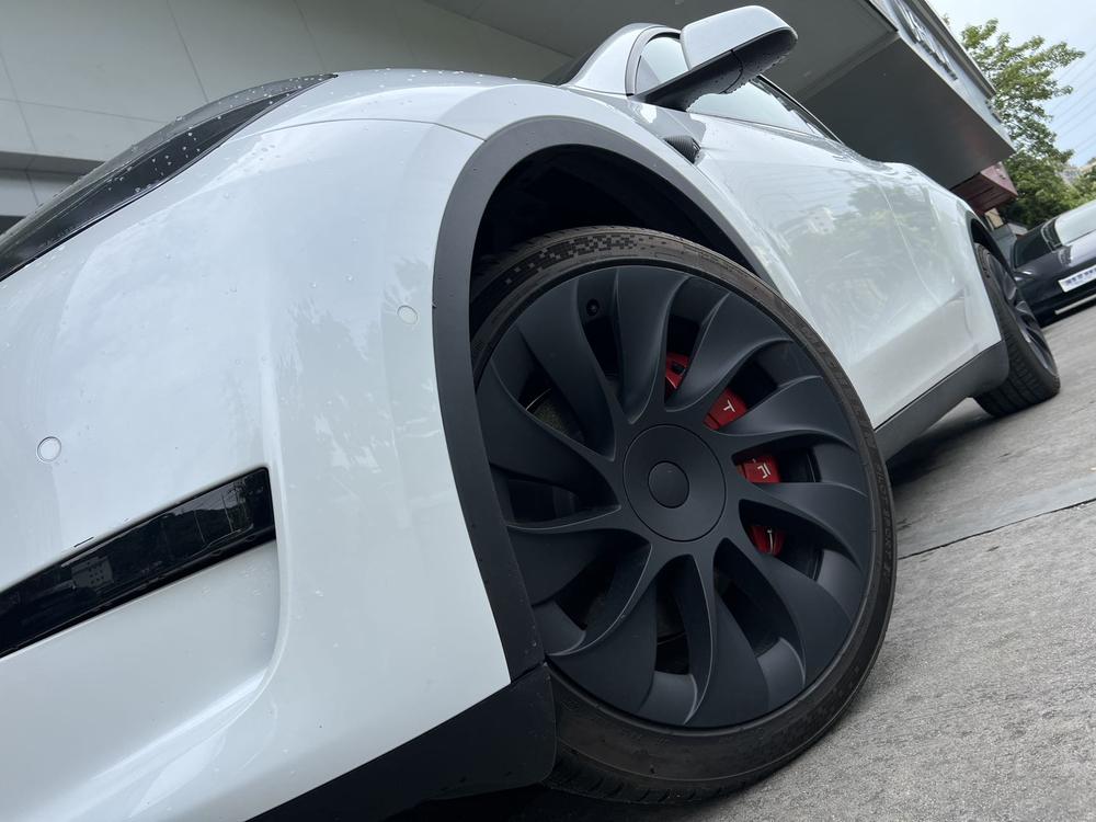 Tesla Model Y 2024 #7 Tesla Model Y 2024 car image #7