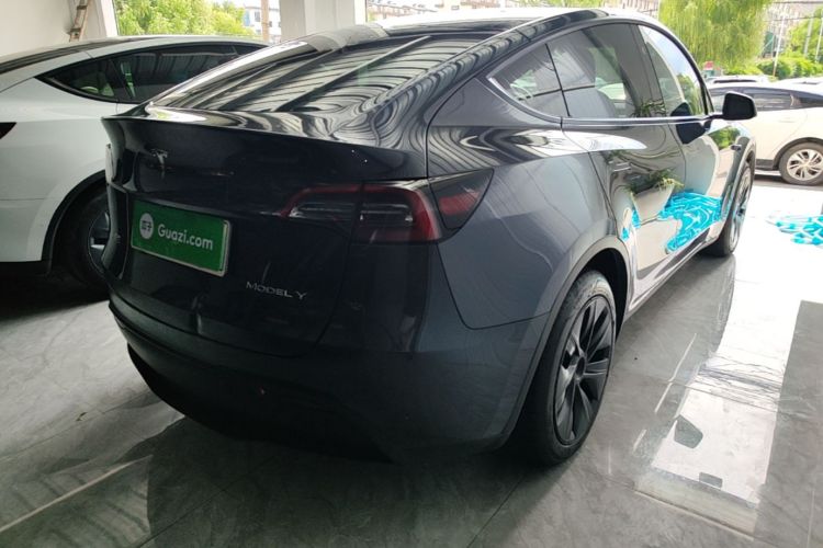 Tesla Model Y 2024 #7 Tesla Model Y 2024 car image #7