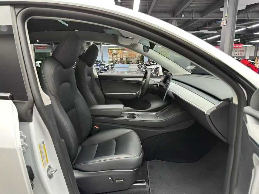 Tesla Model Y 2024 #6 Tesla Model Y 2024 car image #6