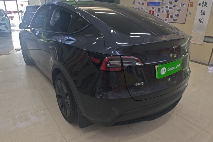 Tesla Model Y 2024 #5 Tesla Model Y 2024 car image #5