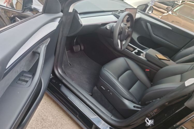 Tesla Model Y 2024 #16 Tesla Model Y 2024 car image #16