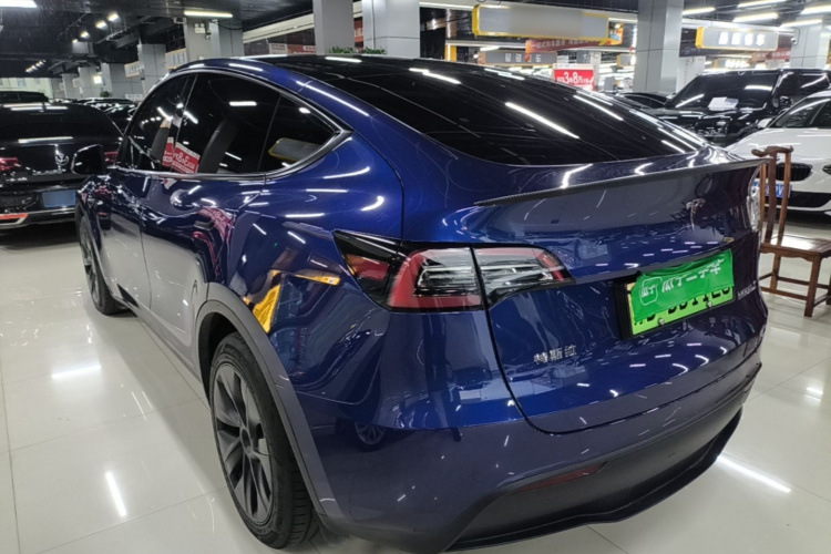 Tesla Model Y 2024 #5 Tesla Model Y 2024 car image #5
