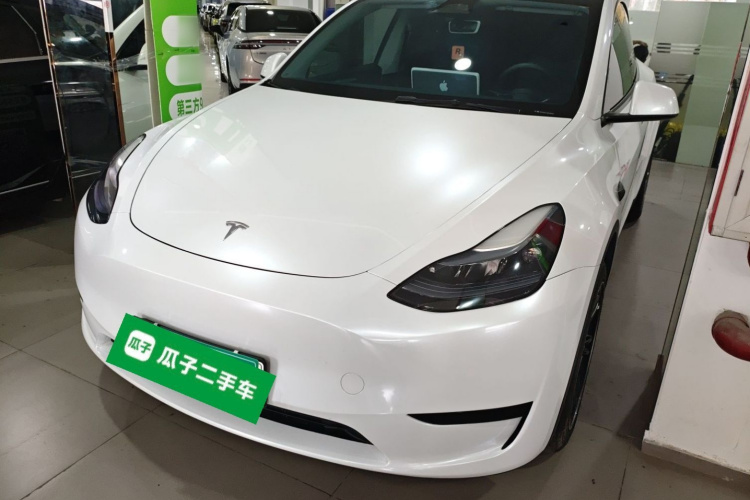 Tesla Model Y 2024 #2 Tesla Model Y 2024 car image #2