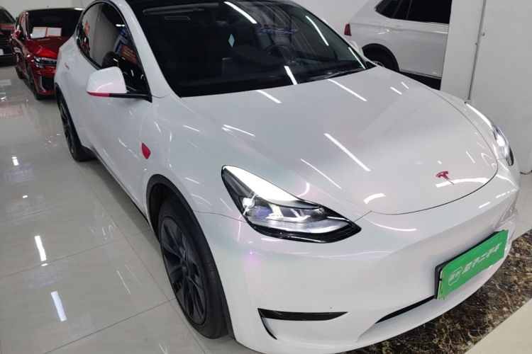Tesla Model Y 2024 #4 Tesla Model Y 2024 car image #4