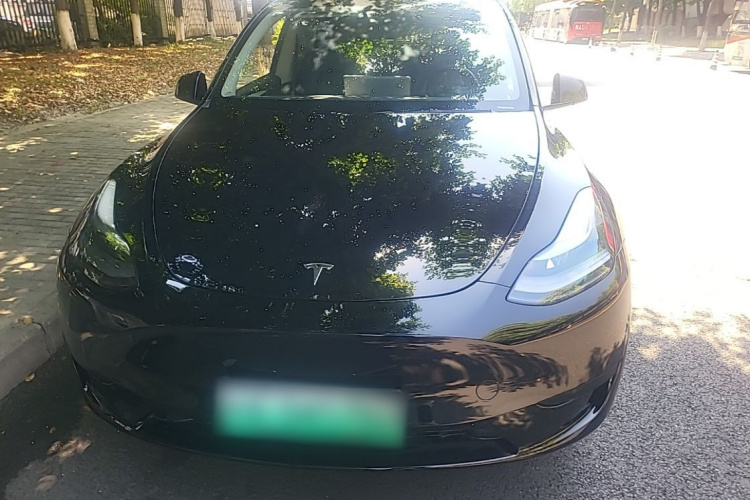 Tesla Model Y 2024 #3 Tesla Model Y 2024 car image #3