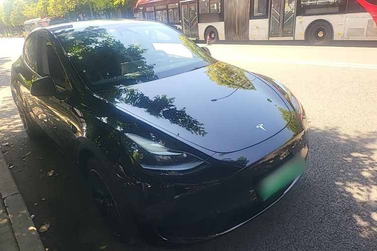 Tesla Model Y 2024 #4 Tesla Model Y 2024 car image #4
