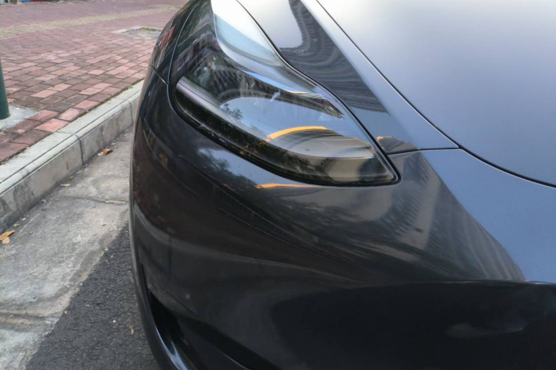 Tesla Model Y 2024 #7 Tesla Model Y 2024 car image #7