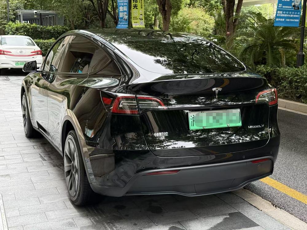 Tesla Model Y 2023 #4 Tesla Model Y 2023 car image #4