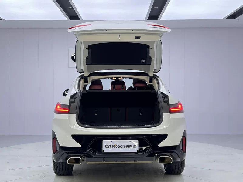 BMW X4 M40i 2024 #10 BMW X4 M40i 2024 immagine di auto #10