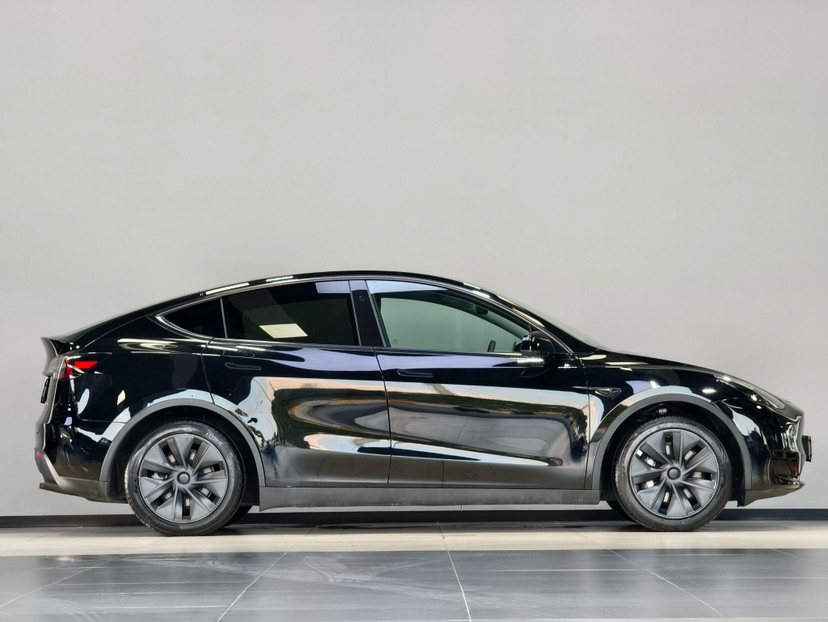Tesla Model Y 2024 #4 Tesla Model Y 2024 car image #4