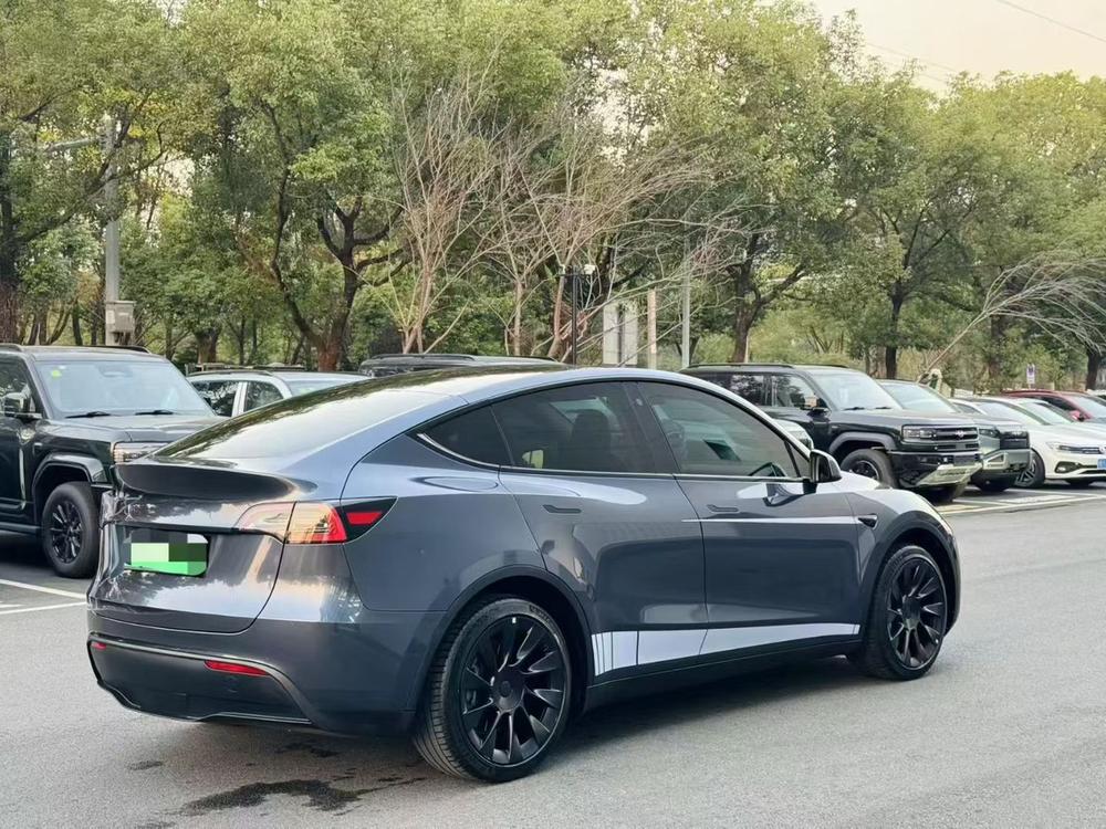 Tesla Model Y 2024 #5 Tesla Model Y 2024 car image #5
