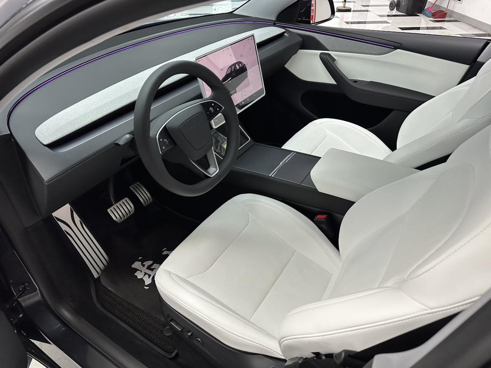 Tesla Model Y 2025 #12 Tesla Model Y 2025 car image #12