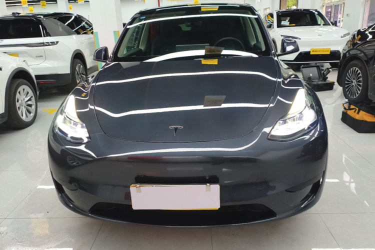 Tesla Model Y 2024 #3 Tesla Model Y 2024 car image #3