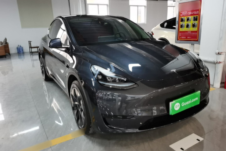 Tesla Model Y 2024 #4 Tesla Model Y 2024 car image #4