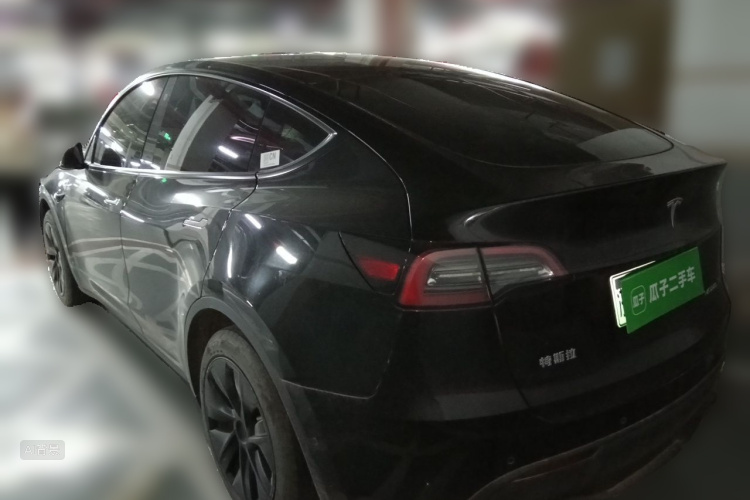 Tesla Model Y 2024 #5 Tesla Model Y 2024 car image #5
