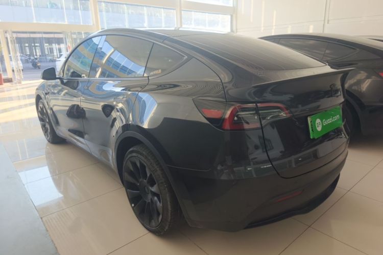 Tesla Model Y 2024 #5 Tesla Model Y 2024 car image #5