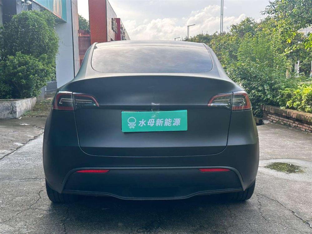 Tesla Model Y 2024 #6 Tesla Model Y 2024 car image #6