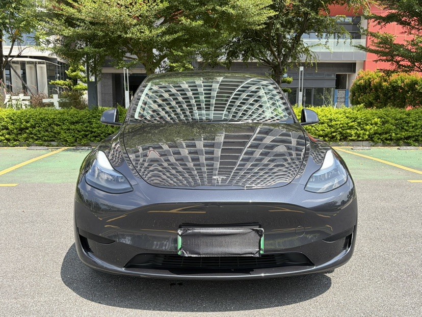 Tesla Model Y 2024 #2 Tesla Model Y 2024 car image #2