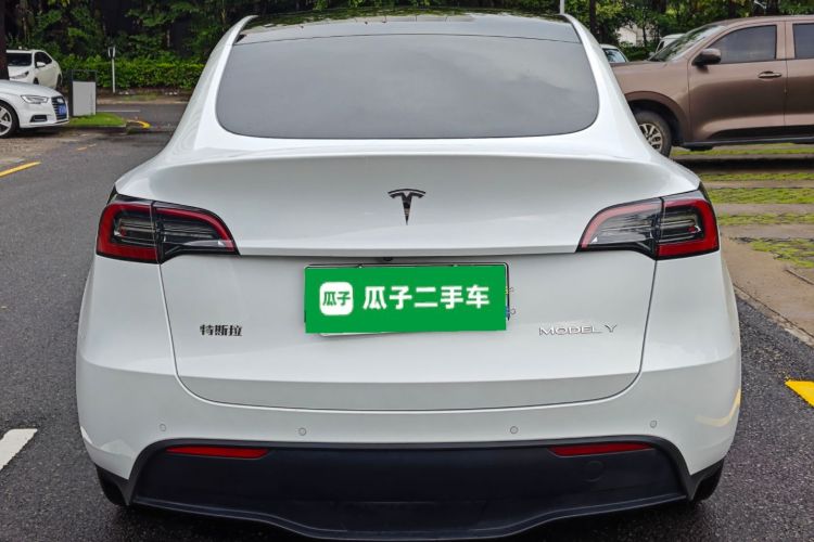 Tesla Model Y 2024 #4 Tesla Model Y 2024 car image #4