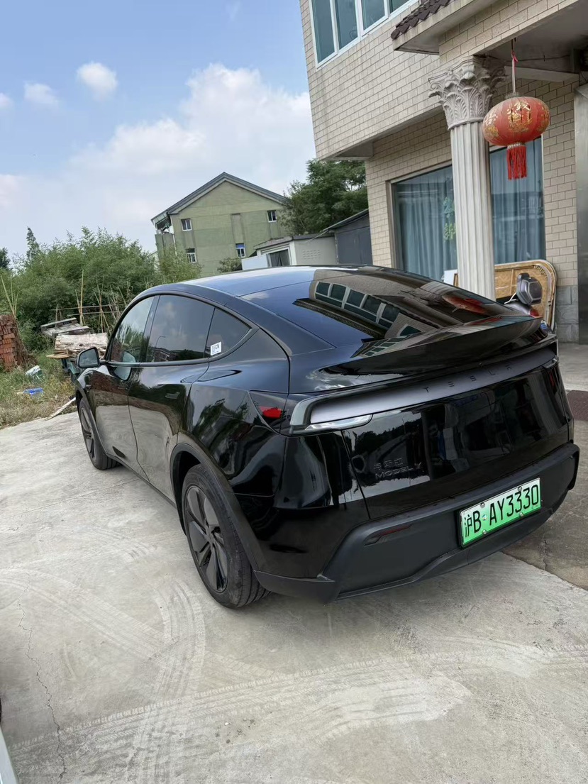 Tesla Model Y 2026 #5 Tesla Model Y 2026 car image #5
