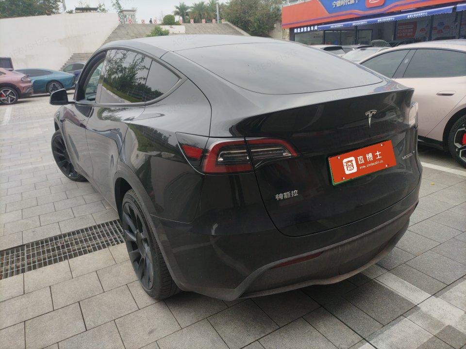 Tesla Model Y 2024 #4 Tesla Model Y 2024 car image #4