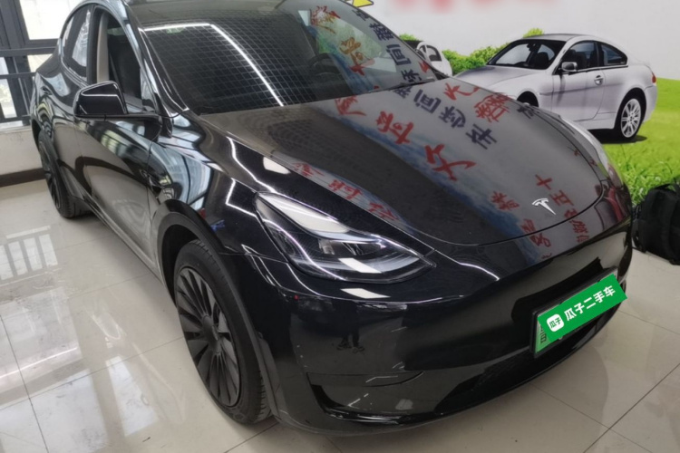 Tesla Model Y 2024 #4 Tesla Model Y 2024 car image #4