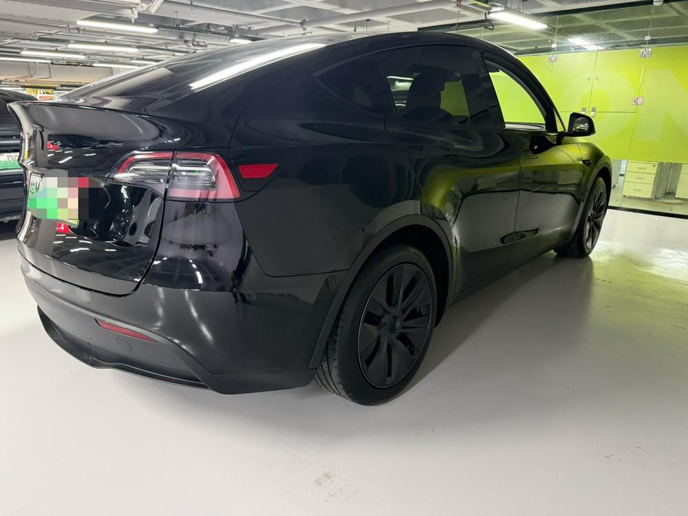 Tesla Model Y 2024 immagine di auto #6