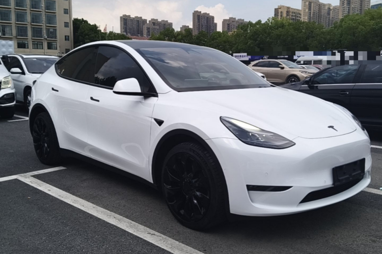 Tesla Model Y 2024 #6 Tesla Model Y 2024 car image #6