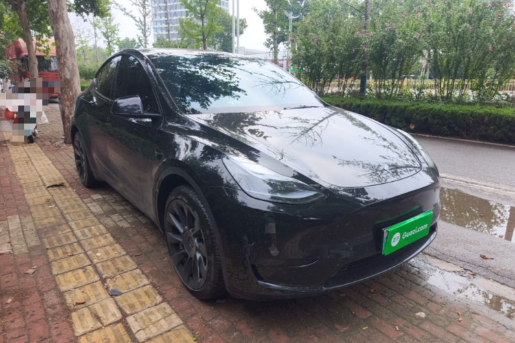 Tesla Model Y 2024 #4 Tesla Model Y 2024 car image #4