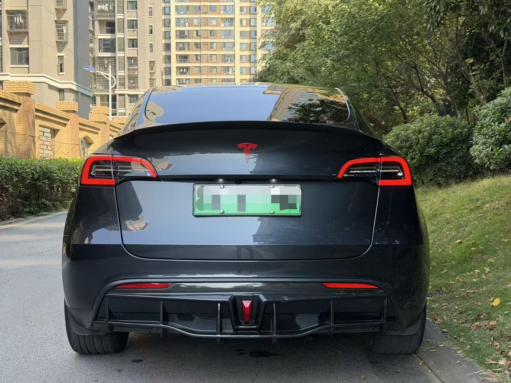 Tesla Model Y 2024 #5 Tesla Model Y 2024 car image #5