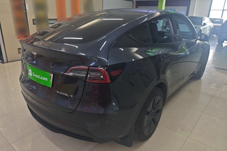 Tesla Model Y 2024 #7 Tesla Model Y 2024 car image #7