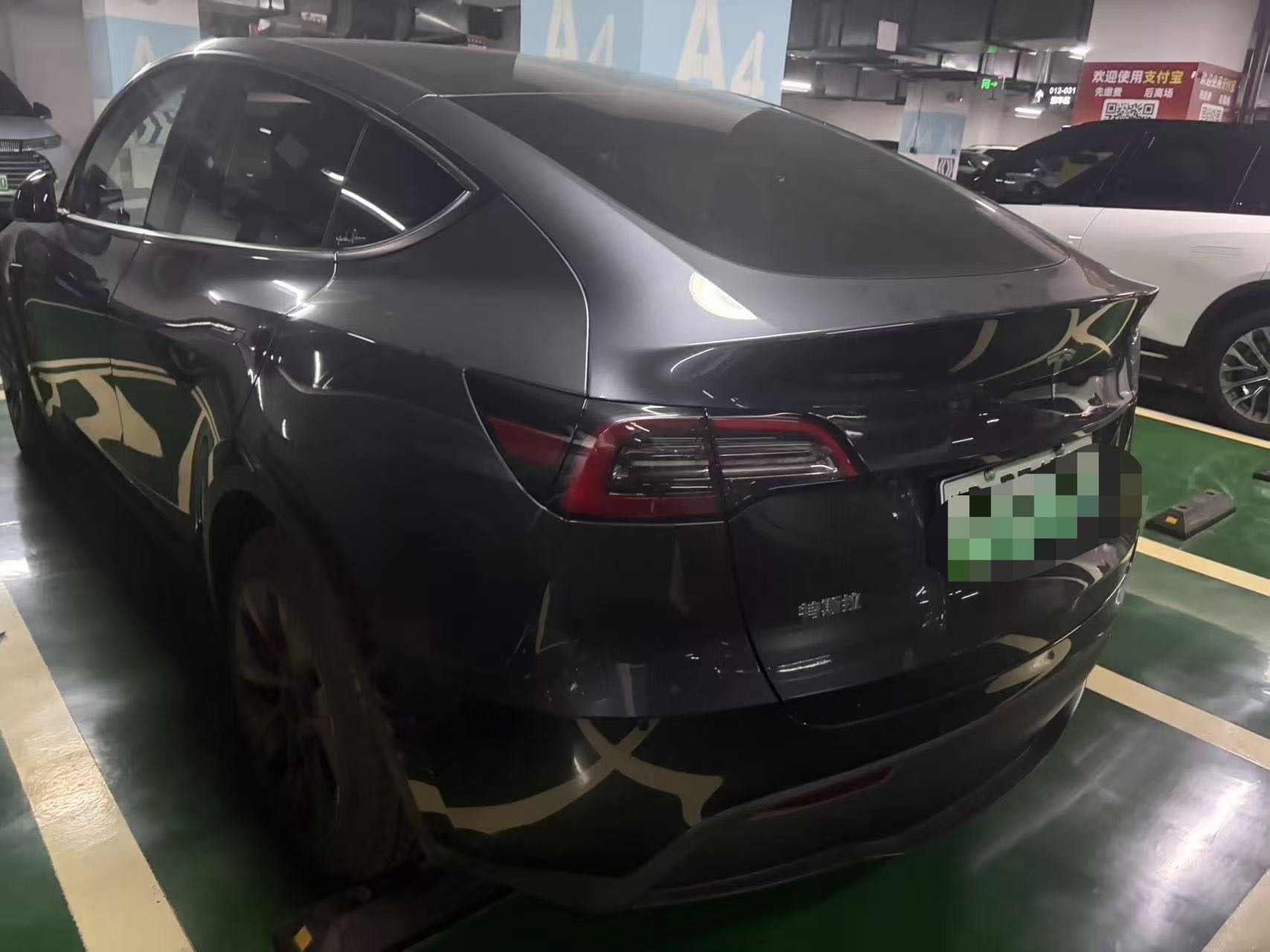 Tesla Model Y 2024 #5 Tesla Model Y 2024 car image #5