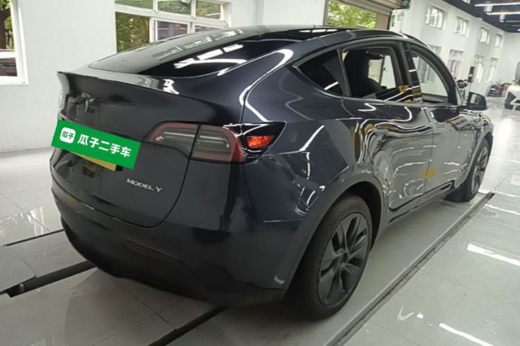 Tesla Model Y 2024 #5 Tesla Model Y 2024 car image #5