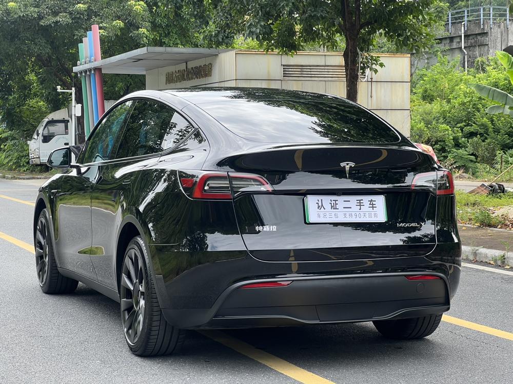 Tesla Model Y 2024 #4 Tesla Model Y 2024 изображение автомобиля #4