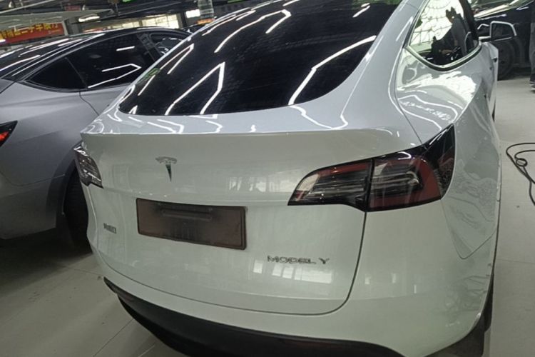 Tesla Model Y 2024 #6 Tesla Model Y 2024 car image #6