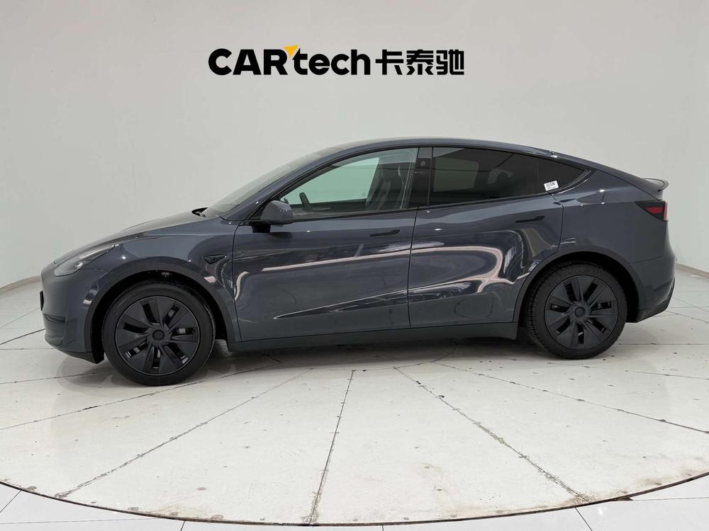 Tesla Model Y 2024 #4 Tesla Model Y 2024 car image #4