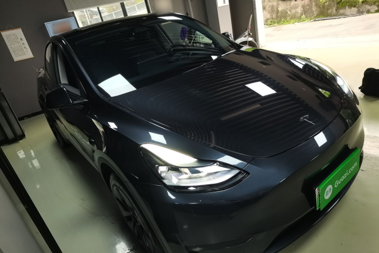 Tesla Model Y 2024 #4 Tesla Model Y 2024 car image #4